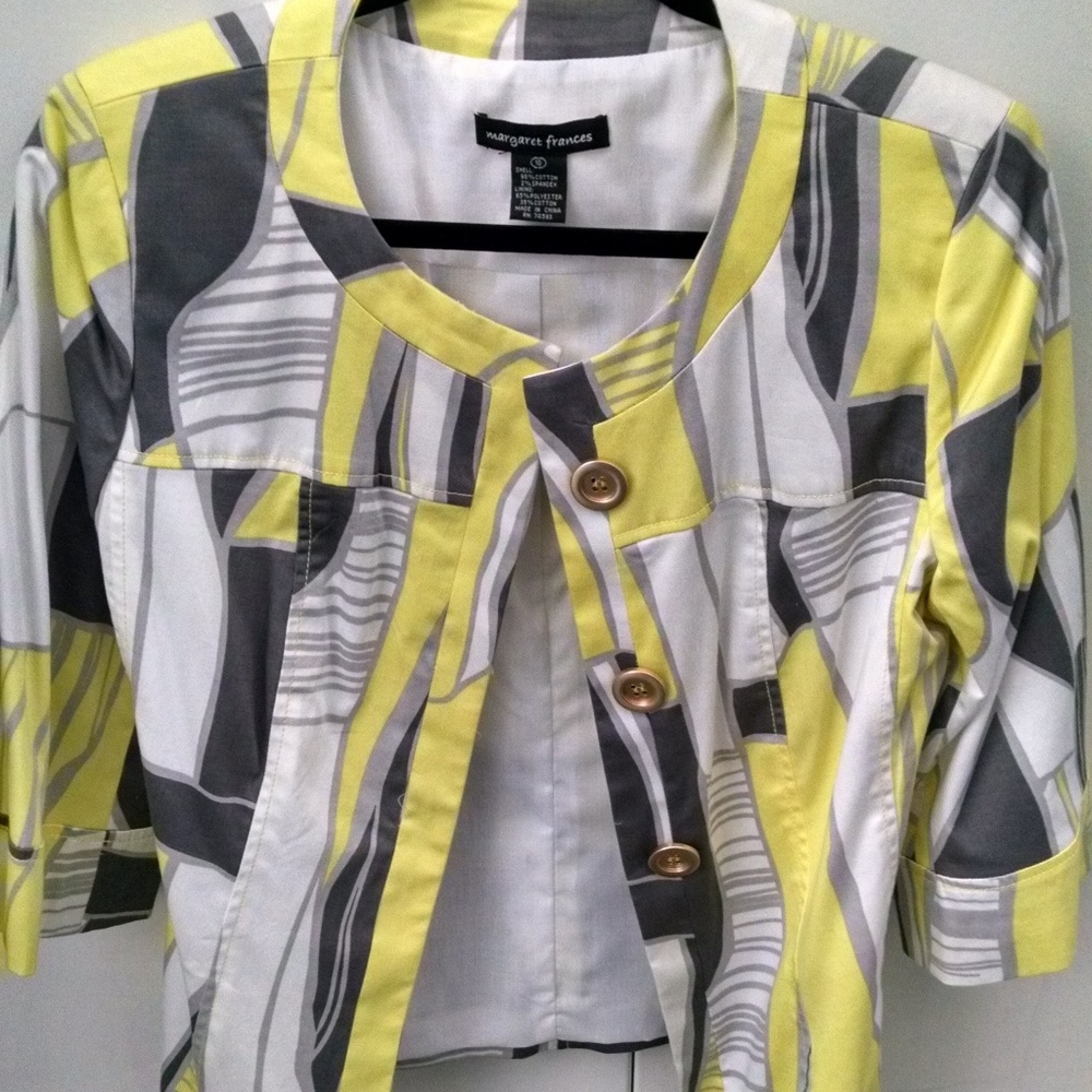 3/4 sleeve modern jacket. Never worn. Size 10